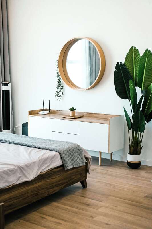 Clean and tidy bedroom in earthy natural colors